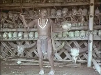 Man dancing with human skull at Chui